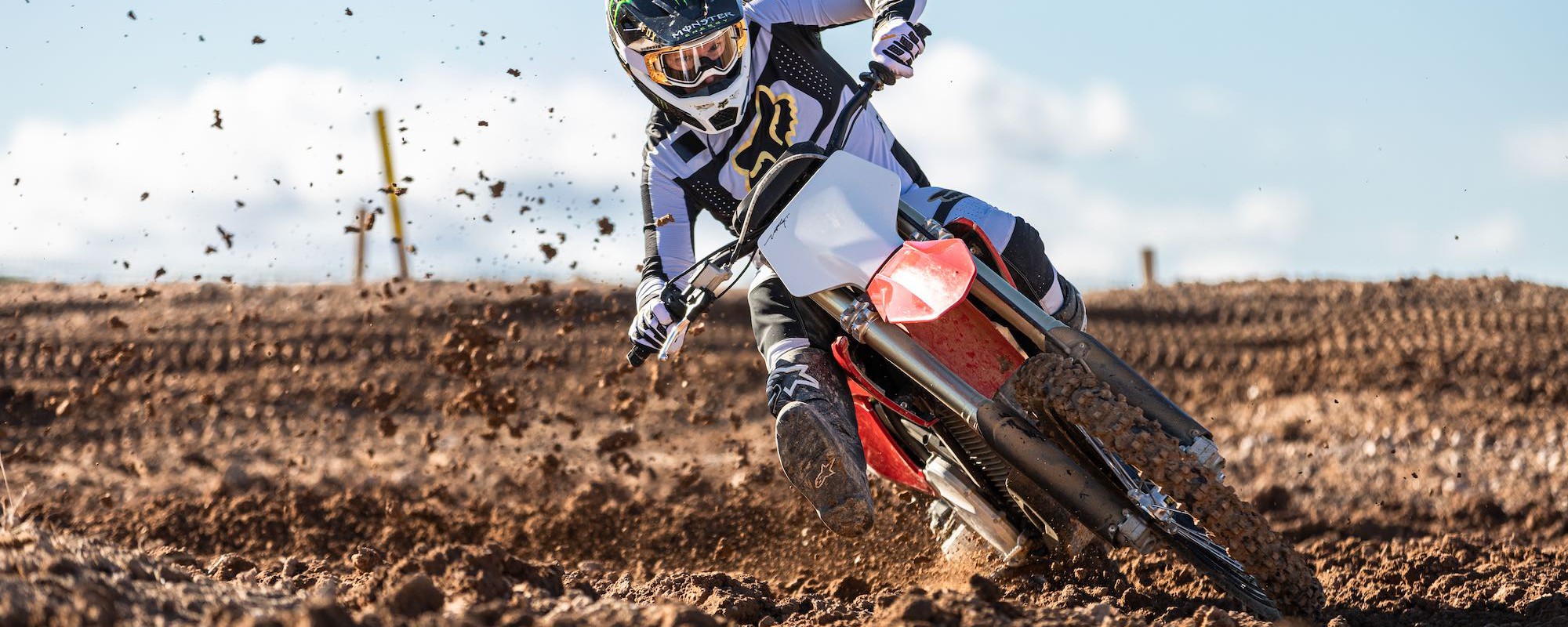 motorbike racing rider competing on stark vary in rough terrain